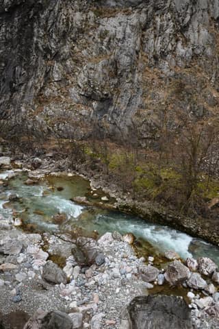 The Lumbardhi i Pejës torrent rushing beneath the cliffs of the Rugova Canyon